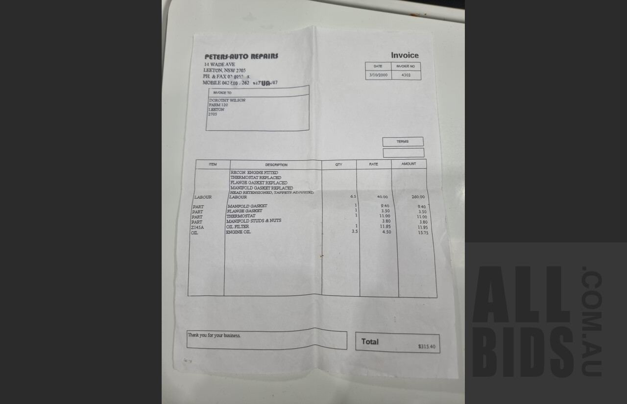 7/1974 Datsun 120y 4d Sedan White 1.2L