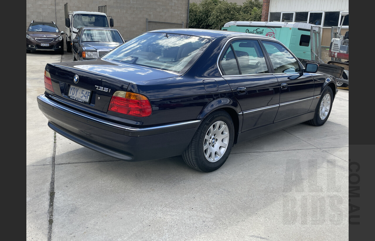 1/1999 Bmw 735i 4d Sedan Blue 3.5L
