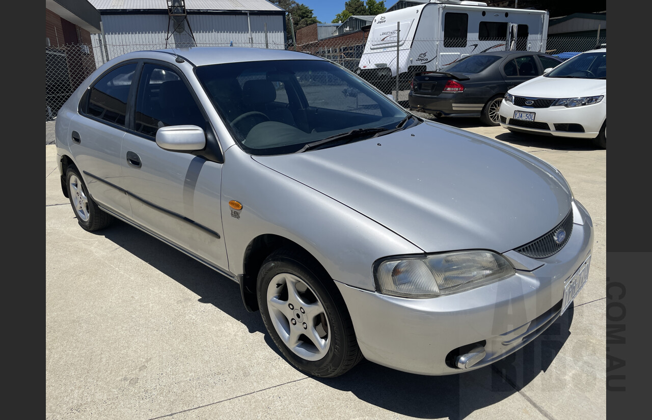 4/1998 Ford Laser GLXi KJII 4d Sedan Silver 1.8L