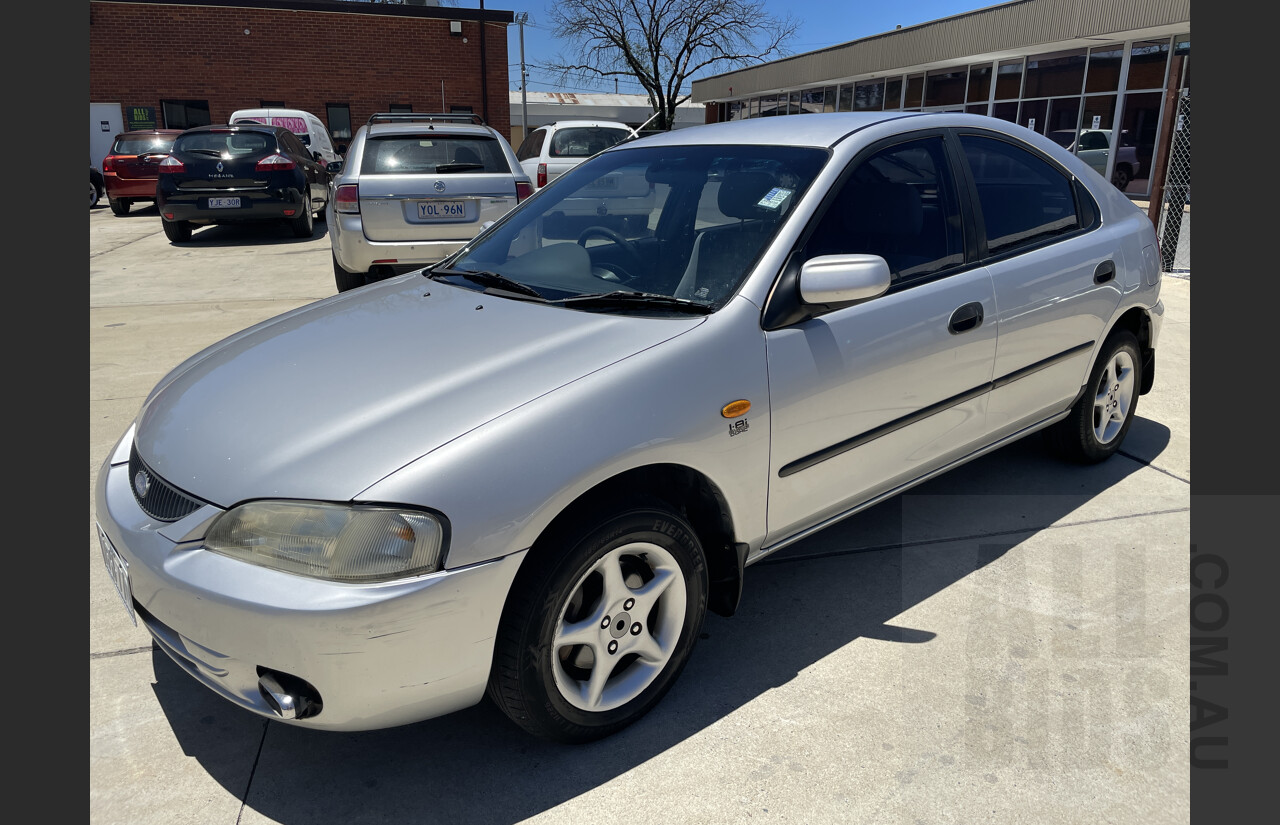 4/1998 Ford Laser GLXi KJII 4d Sedan Silver 1.8L