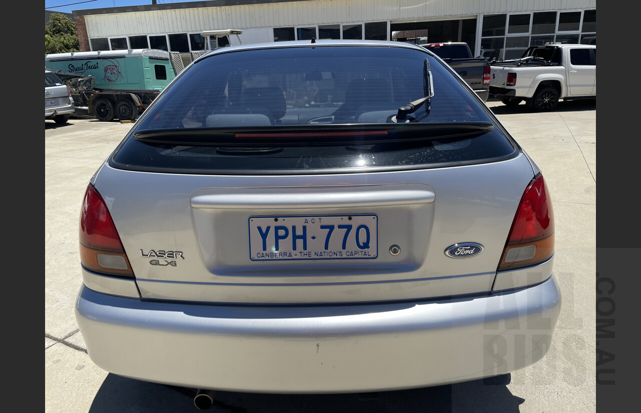 4/1998 Ford Laser GLXi KJII 4d Sedan Silver 1.8L