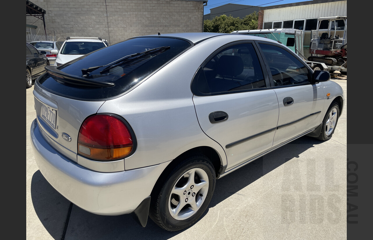 4/1998 Ford Laser GLXi KJII 4d Sedan Silver 1.8L