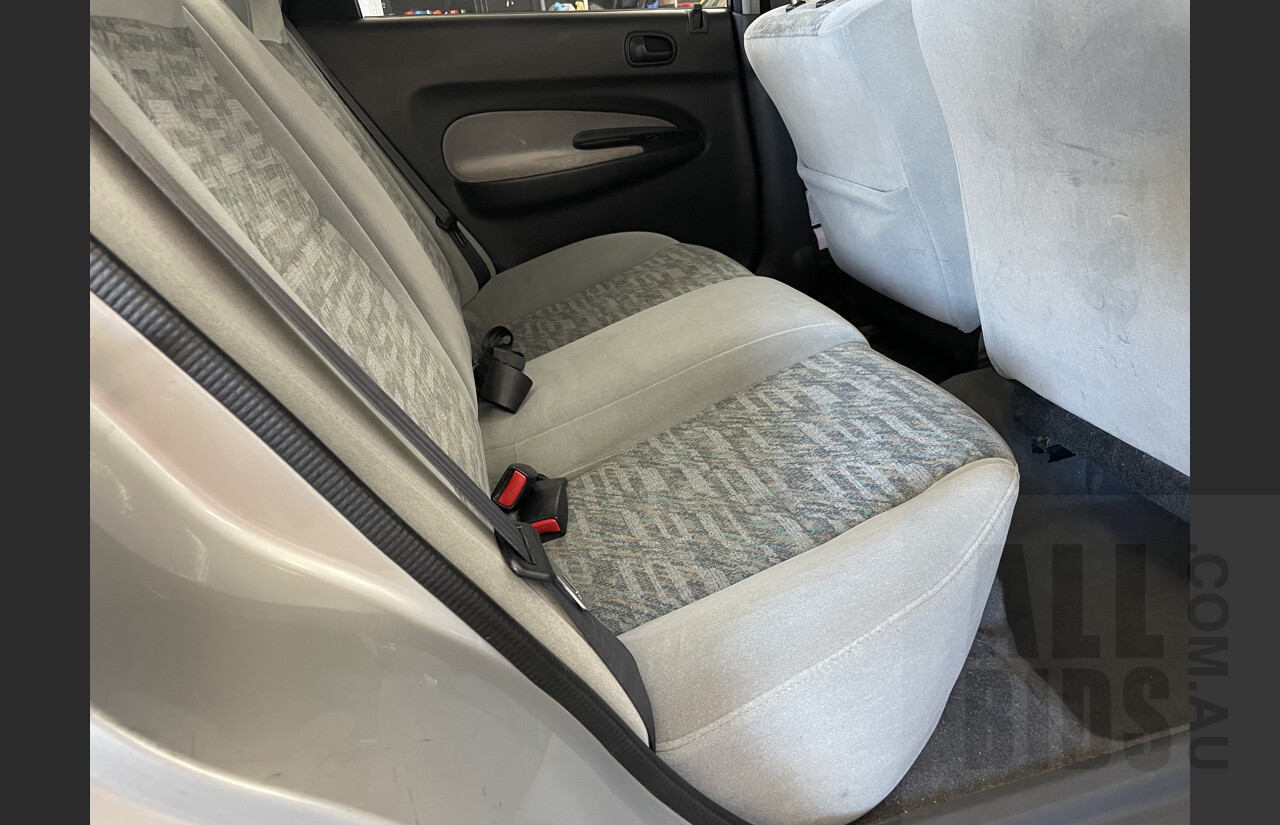 4/1998 Ford Laser GLXi KJII 4d Sedan Silver 1.8L