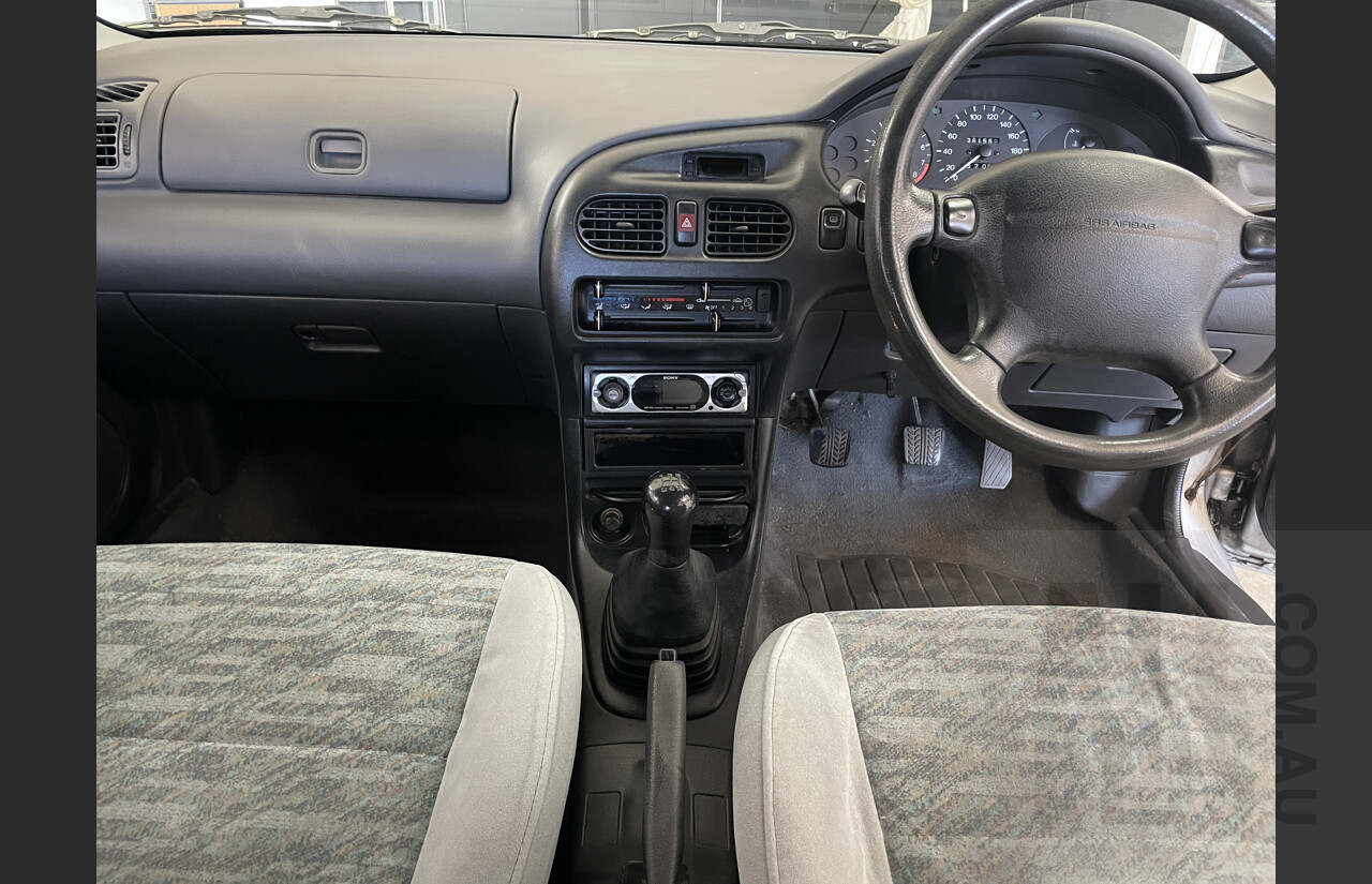 4/1998 Ford Laser GLXi KJII 4d Sedan Silver 1.8L