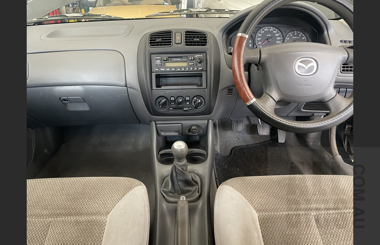 6/2000 Mazda 323 Astina  5d Hatchback Black 1.6L