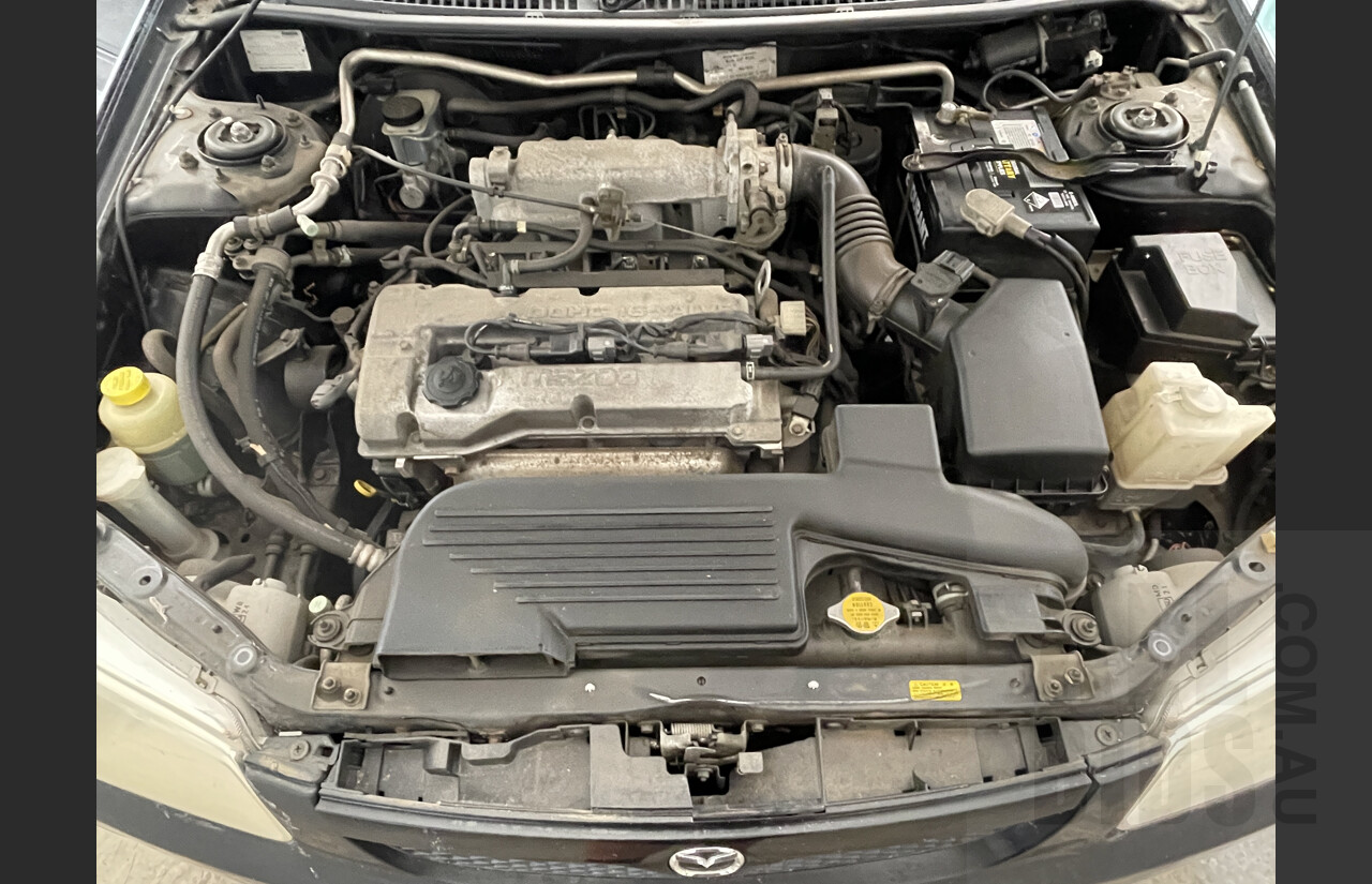 6/2000 Mazda 323 Astina  5d Hatchback Black 1.6L