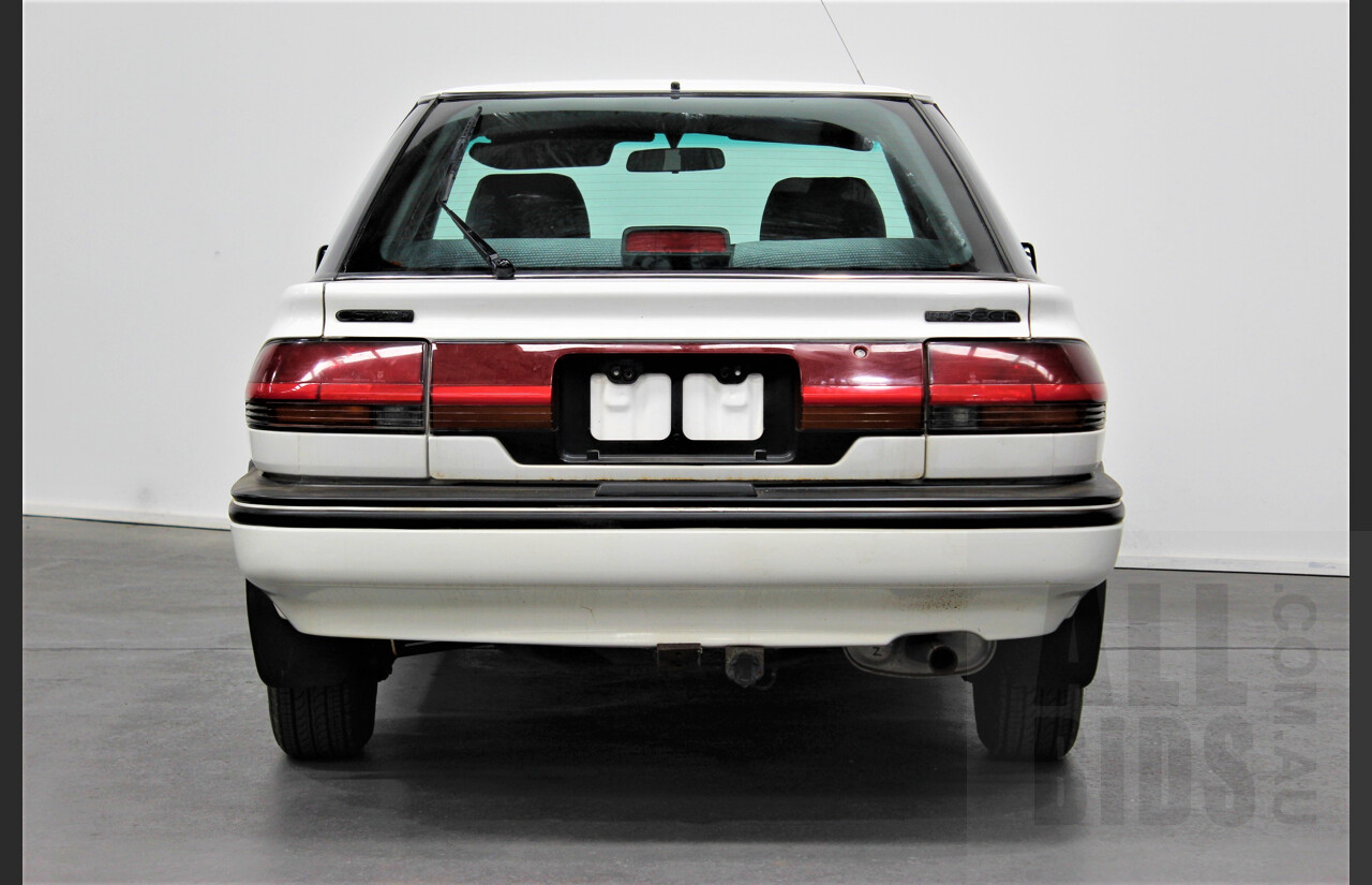 10/1991 Toyota Corolla CSi SECA AE94 5d Liftback White 1.6L Low 57,000ks