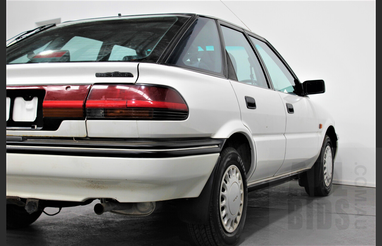 10/1991 Toyota Corolla CSi SECA AE94 5d Liftback White 1.6L Low 57,000ks