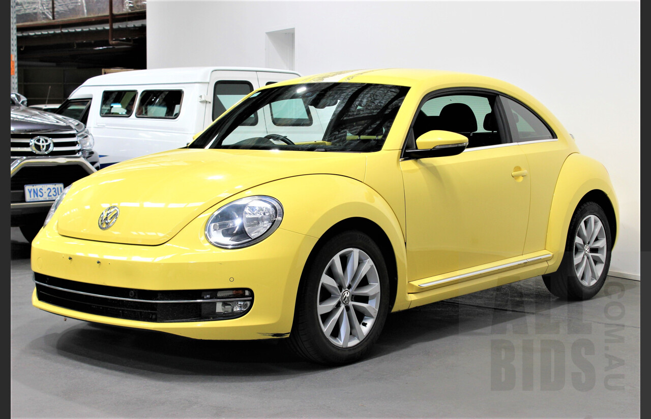 7/2013 Volkswagen Beetle 1L 3dr Hatchback Yellow 1.4L Twincharge Manual