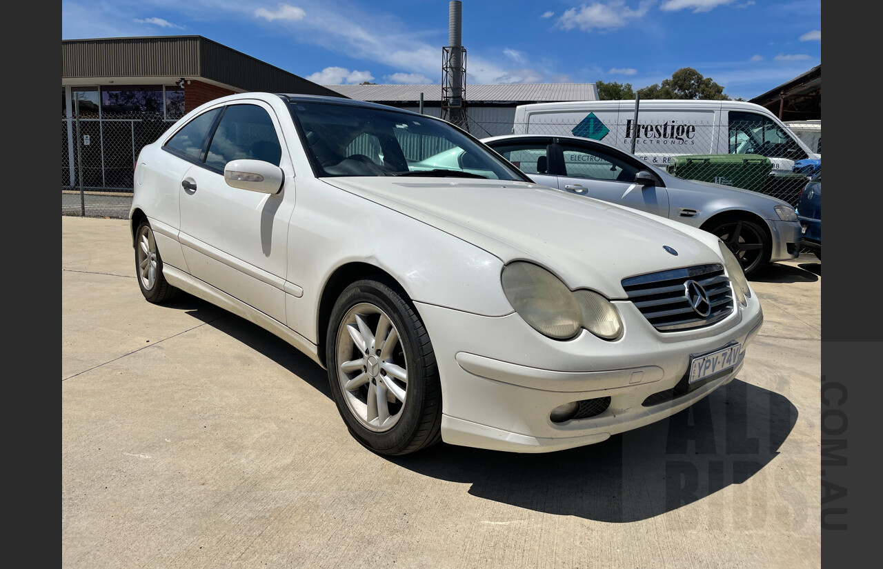 10/2002 Mercedes-Benz C200 Kompressor CL203 2d Coupe White 1.8L