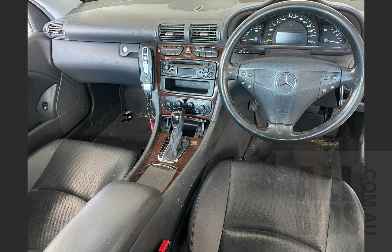 10/2002 Mercedes-Benz C200 Kompressor CL203 2d Coupe White 1.8L