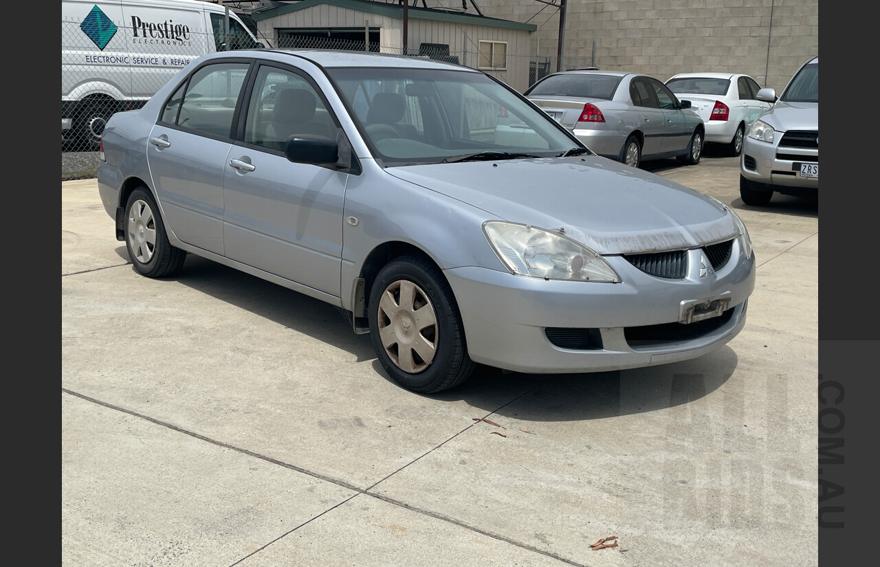 11/2004 Mitsubishi Lancer ES CH 4d Sedan Silver  2.0L