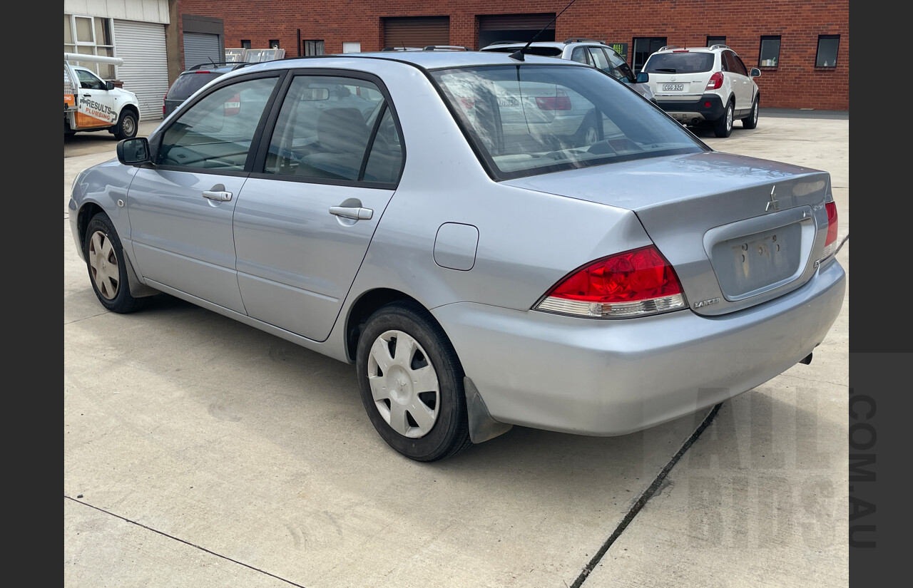 11/2004 Mitsubishi Lancer ES CH 4d Sedan Silver  2.0L