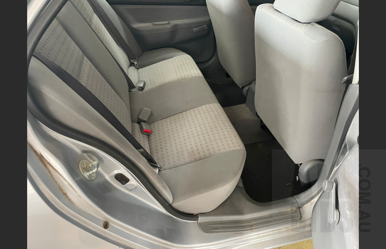 11/2004 Mitsubishi Lancer ES CH 4d Sedan Silver  2.0L