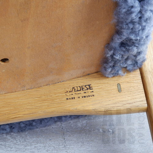 Yngve Ekstrom (Sweden 1913-1988) Lamino Oak Lounge Chair and Footstool with Sheepskin Upholstery
