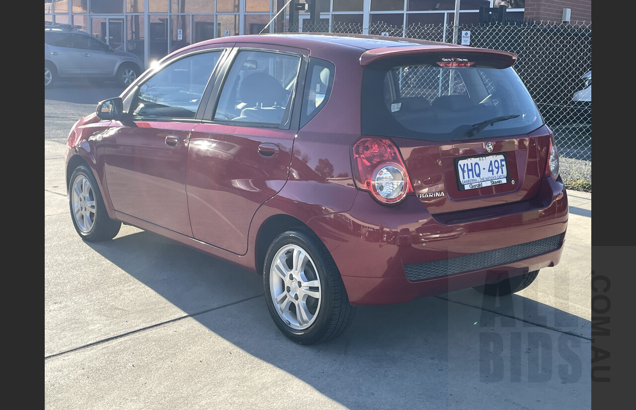 7/2011 Holden Barina  TK MY11 5d Hatchback Red 1.6L