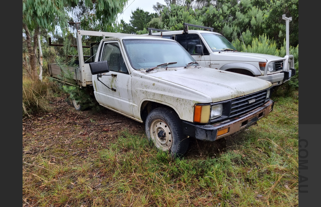 7/1986 Toyota Hilux YN57 2d P/up White 2.0L