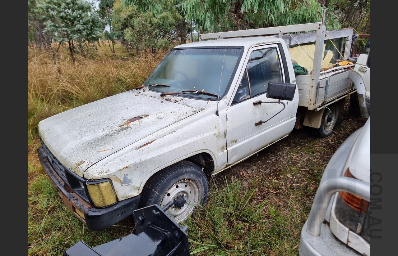 7/1986 Toyota Hilux YN57 2d P/up White 2.0L
