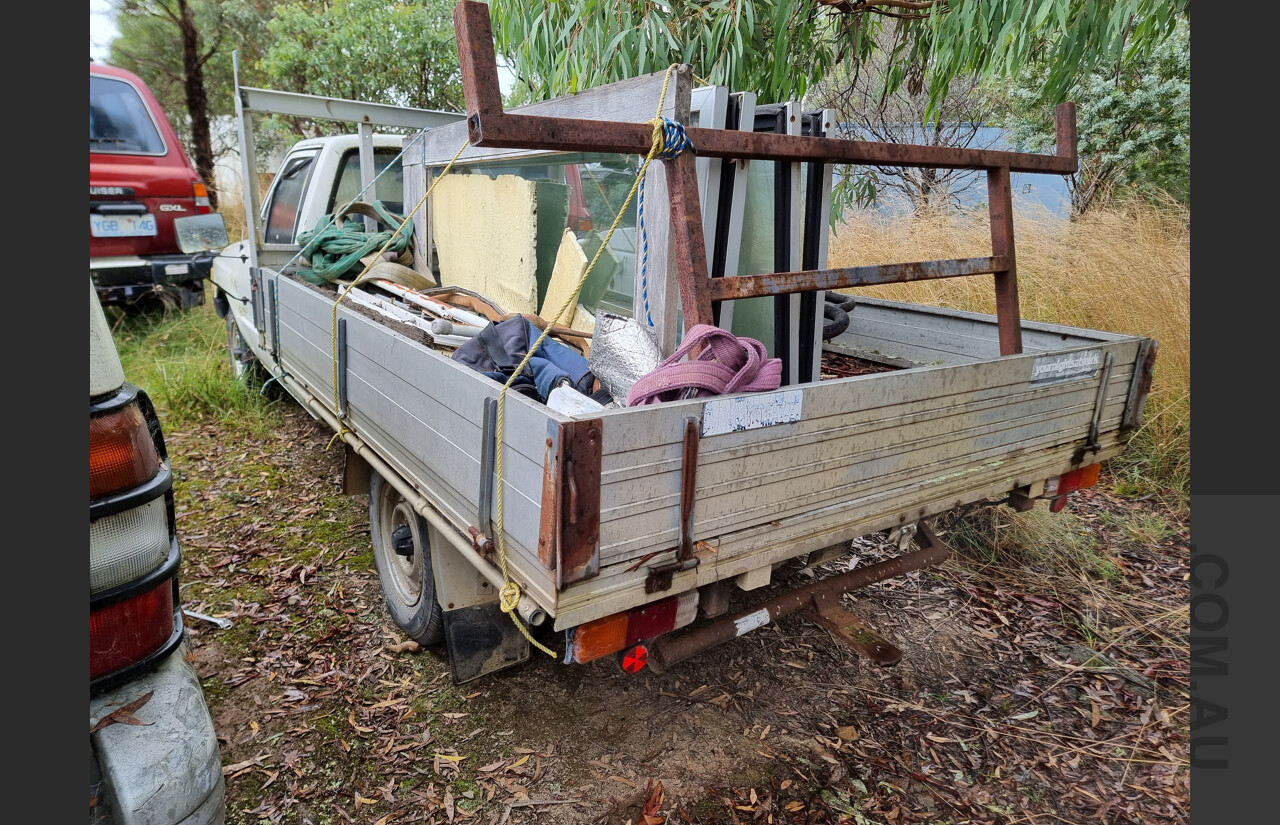 7/1986 Toyota Hilux YN57 2d P/up White 2.0L