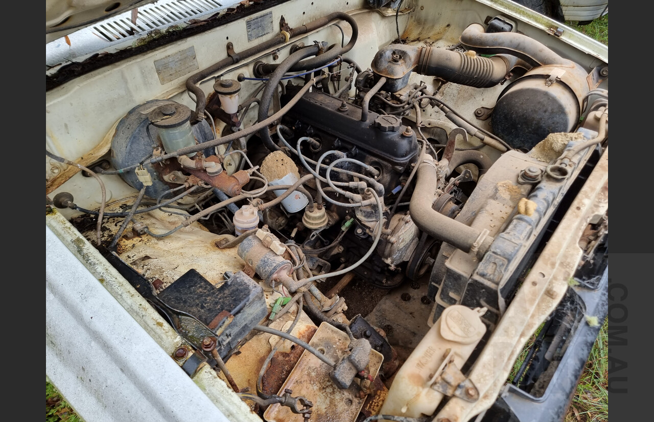 7/1986 Toyota Hilux YN57 2d P/up White 2.0L