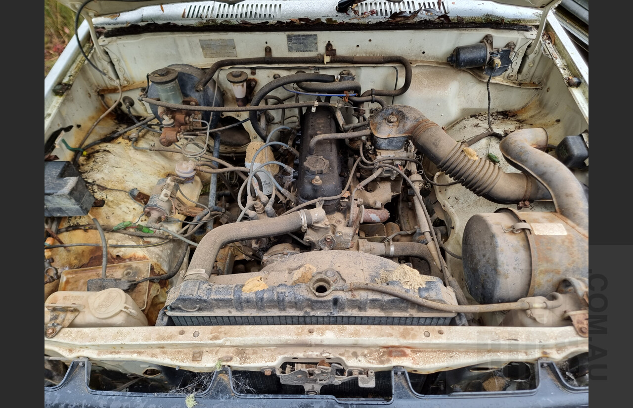 7/1986 Toyota Hilux YN57 2d P/up White 2.0L