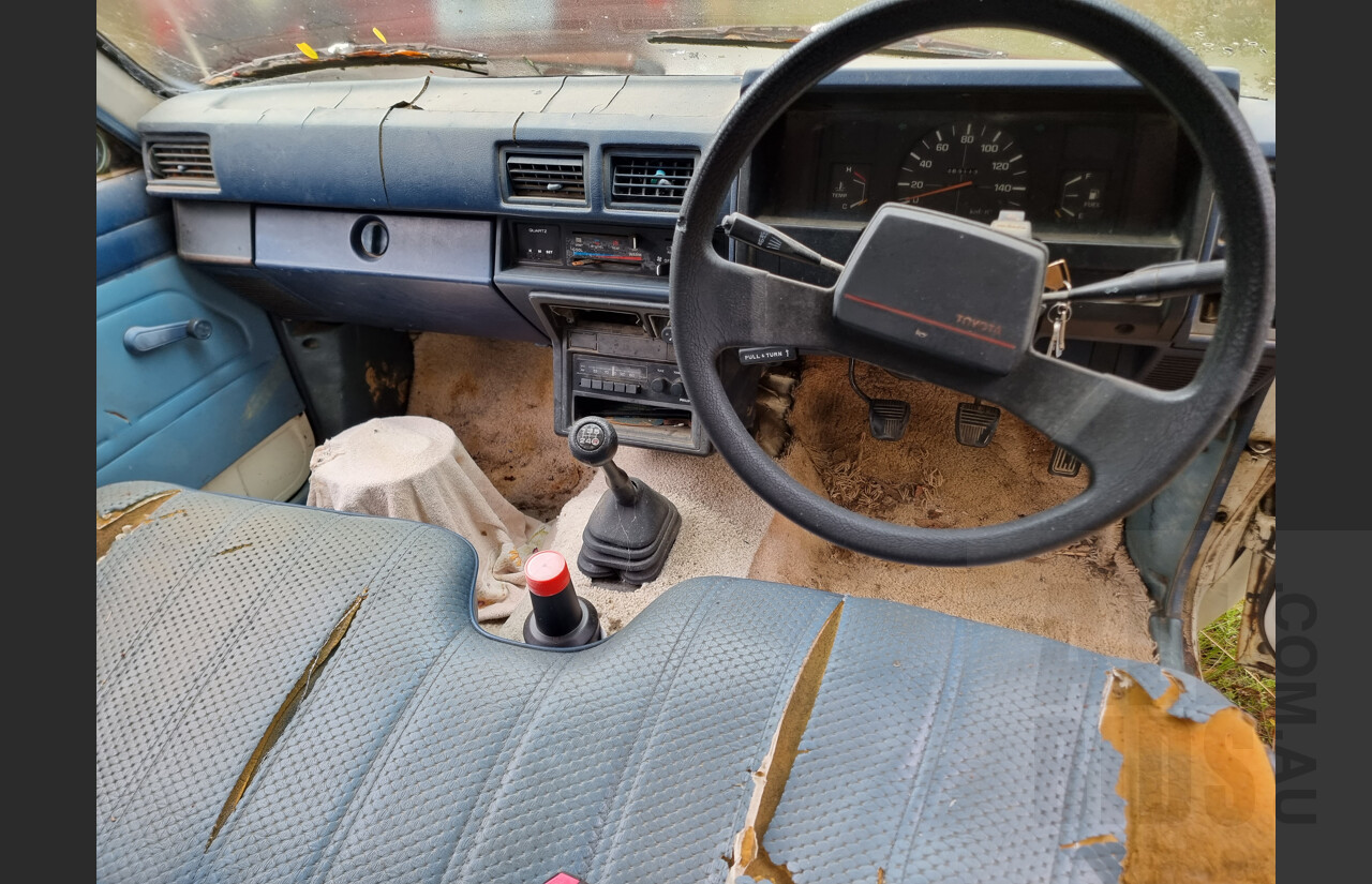 7/1986 Toyota Hilux YN57 2d P/up White 2.0L