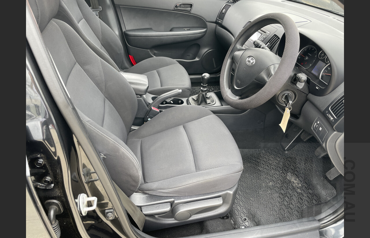 6/2009 Hyundai i30 SX FD MY09 5d Hatchback Black 2.0L