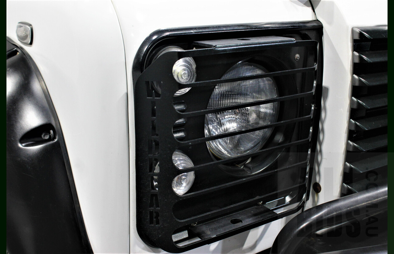 12/2011 Land Rover Defender 90 MY12 2d Wagon White 2.2L Turbo Diesel
