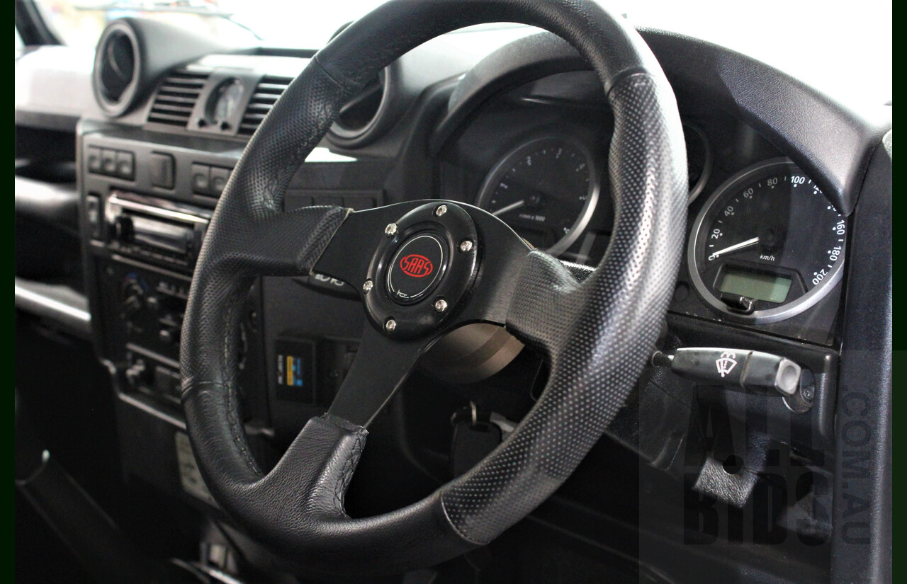 12/2011 Land Rover Defender 90 MY12 2d Wagon White 2.2L Turbo Diesel