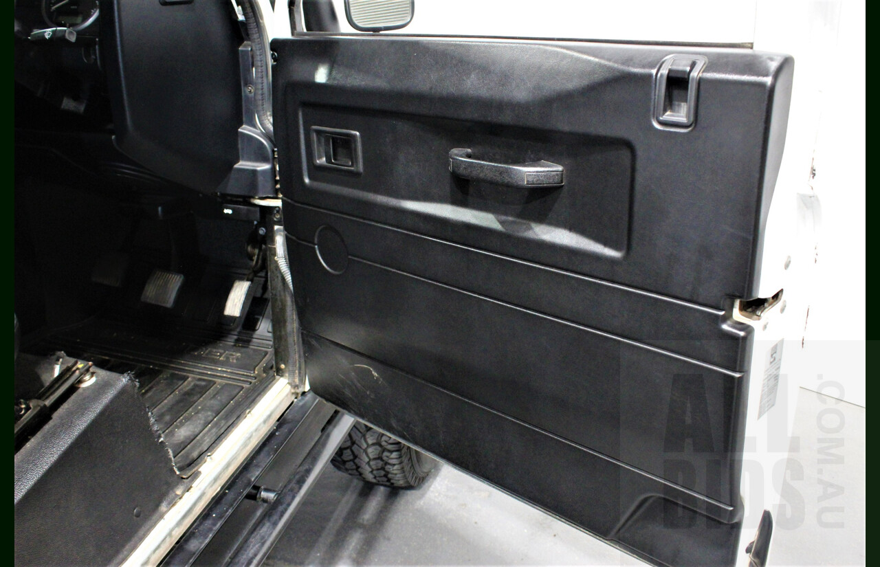 12/2011 Land Rover Defender 90 MY12 2d Wagon White 2.2L Turbo Diesel