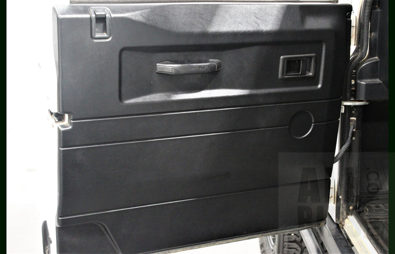 12/2011 Land Rover Defender 90 MY12 2d Wagon White 2.2L Turbo Diesel