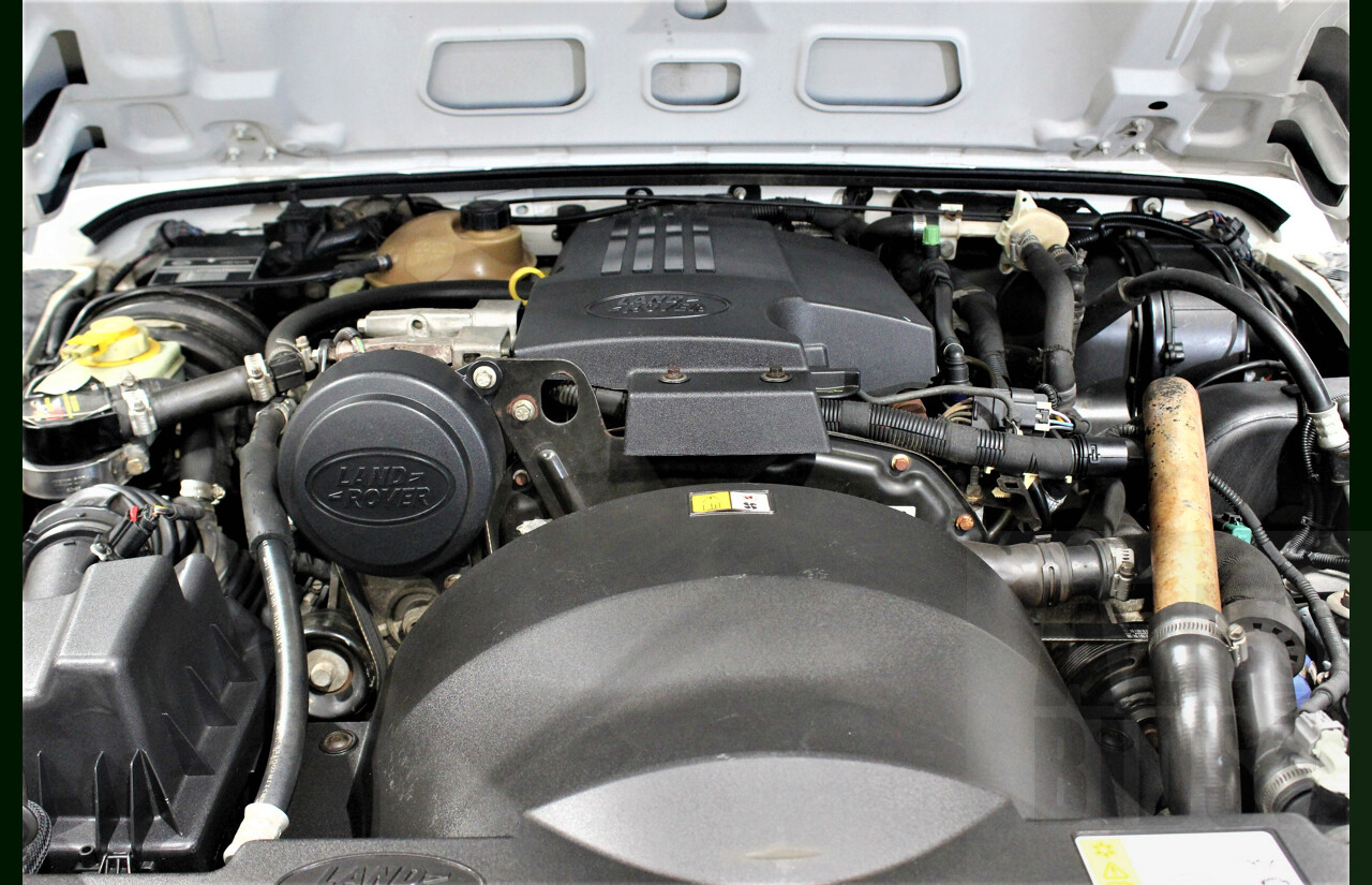 12/2011 Land Rover Defender 90 MY12 2d Wagon White 2.2L Turbo Diesel