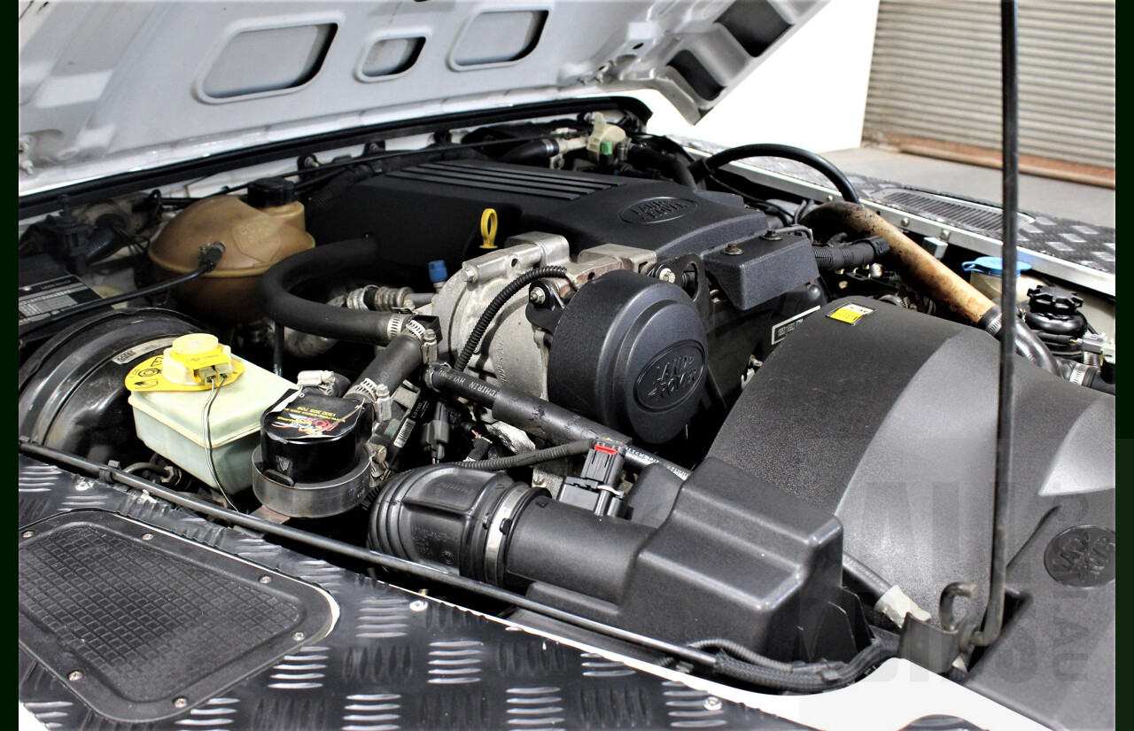 12/2011 Land Rover Defender 90 MY12 2d Wagon White 2.2L Turbo Diesel