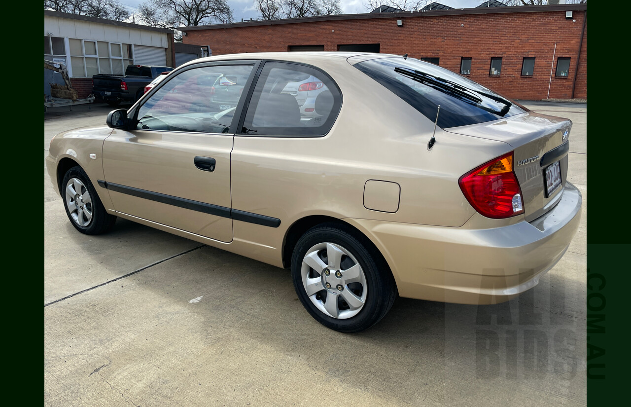 5/2003 Hyundai Accent LC 3d Hatchback Gold 1.6L