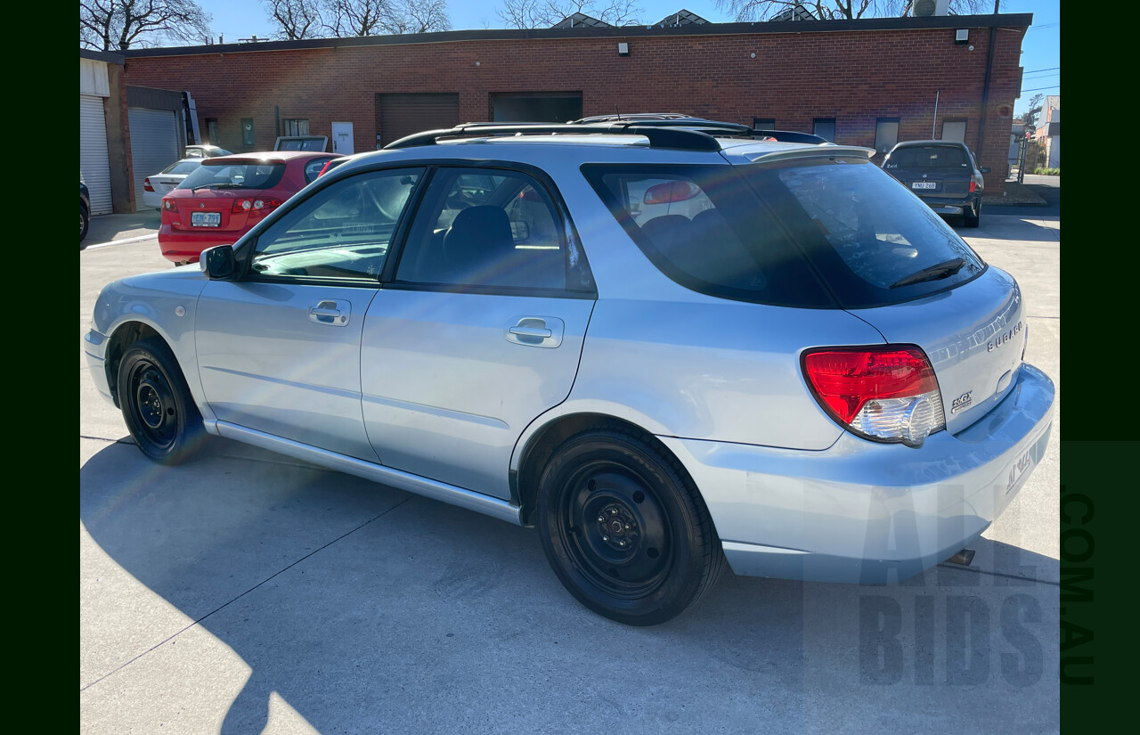 10/2004 Subaru Impreza GX (awd) MY04 4d Sedan Blue 2.0L