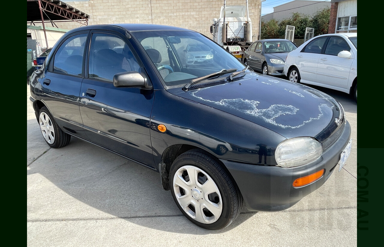 10/1996 Mazda 121 4d Sedan Blue 1.3L