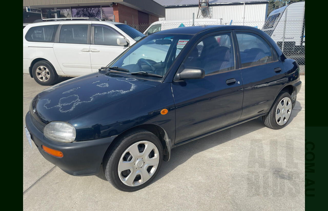 10/1996 Mazda 121 4d Sedan Blue 1.3L
