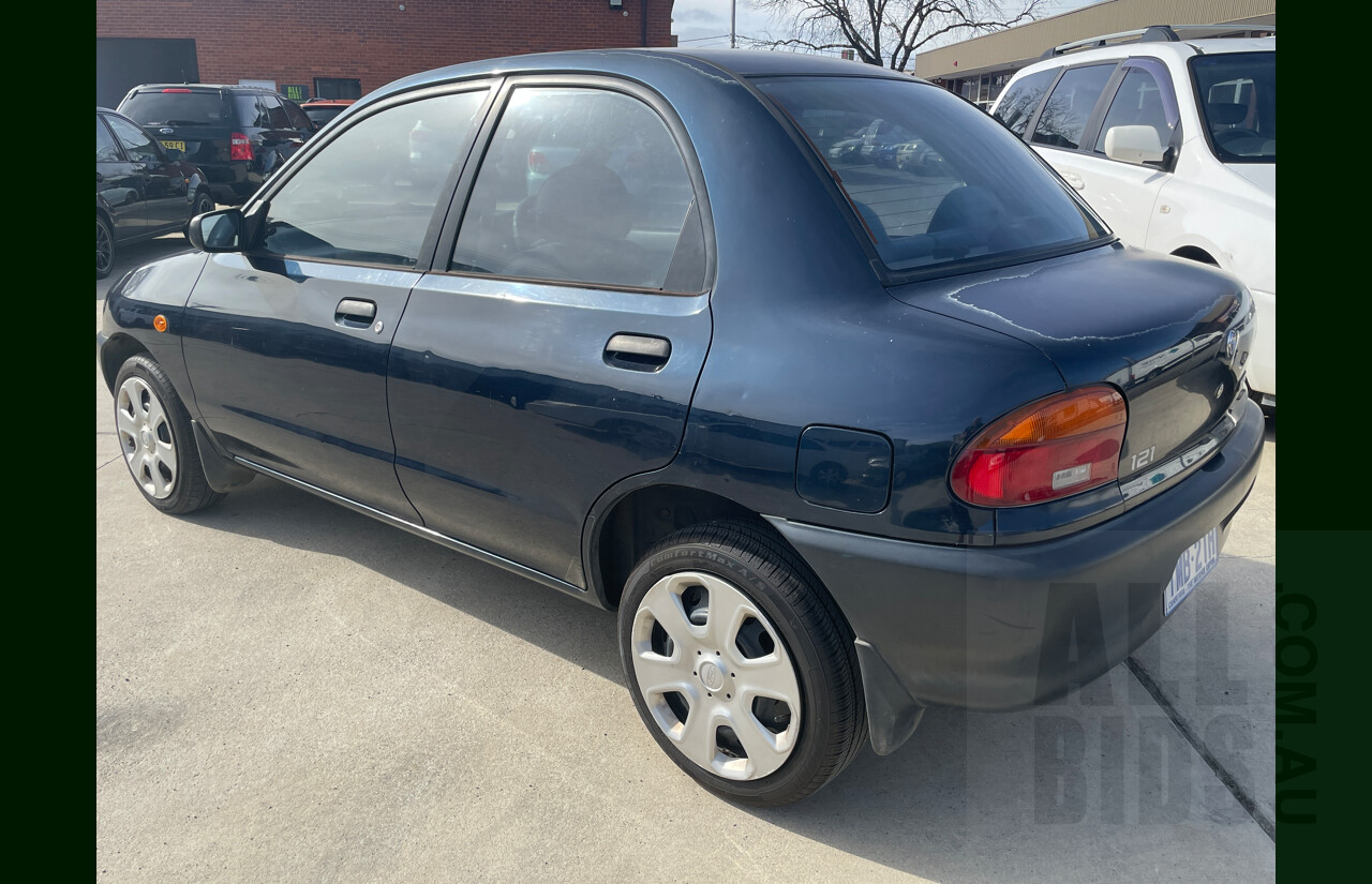 10/1996 Mazda 121 4d Sedan Blue 1.3L