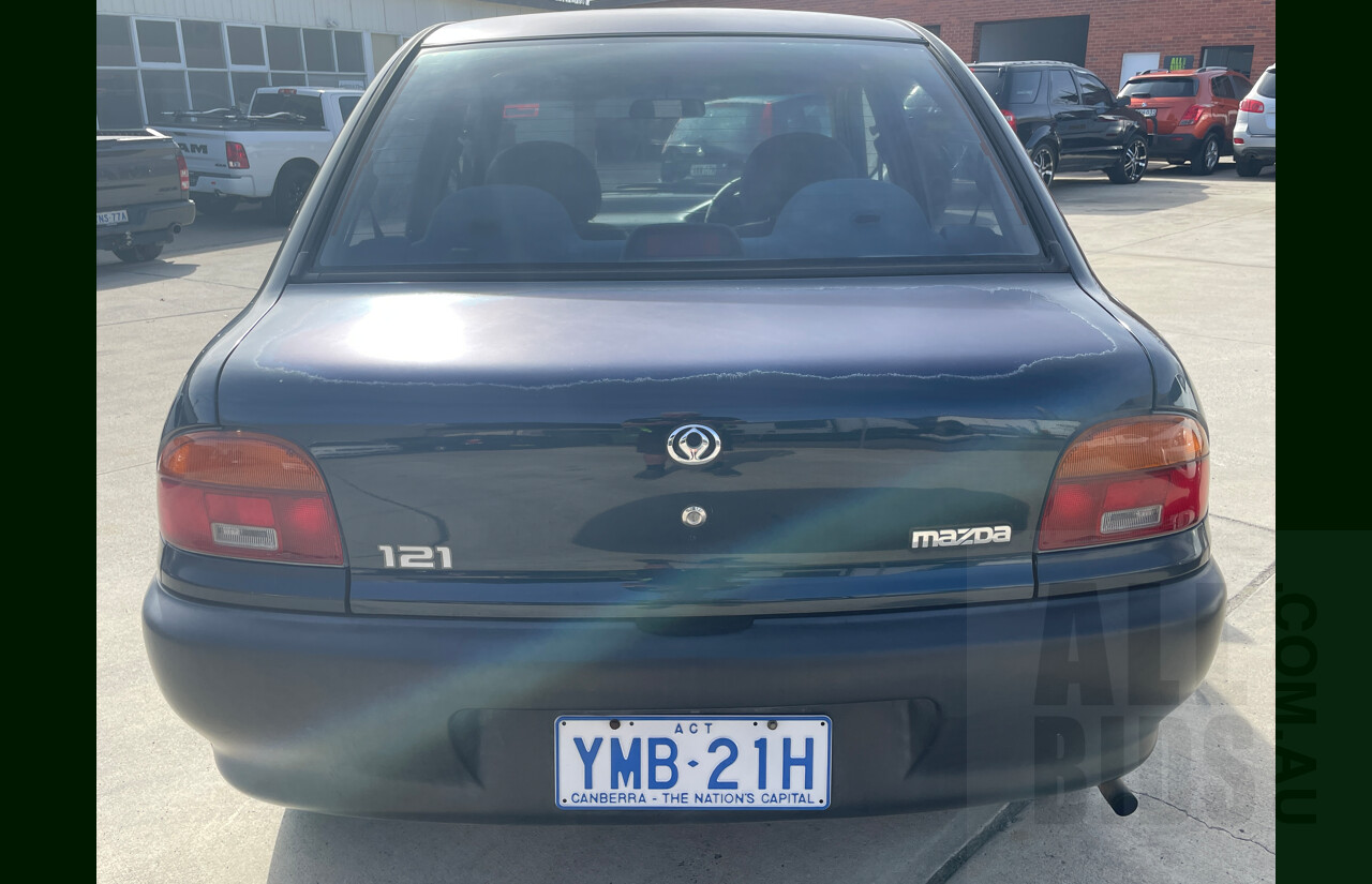 10/1996 Mazda 121 4d Sedan Blue 1.3L