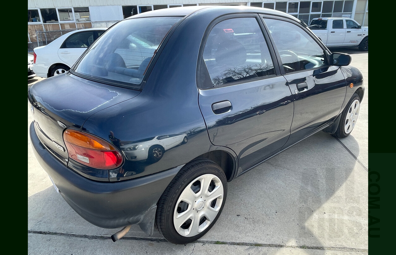 10/1996 Mazda 121 4d Sedan Blue 1.3L