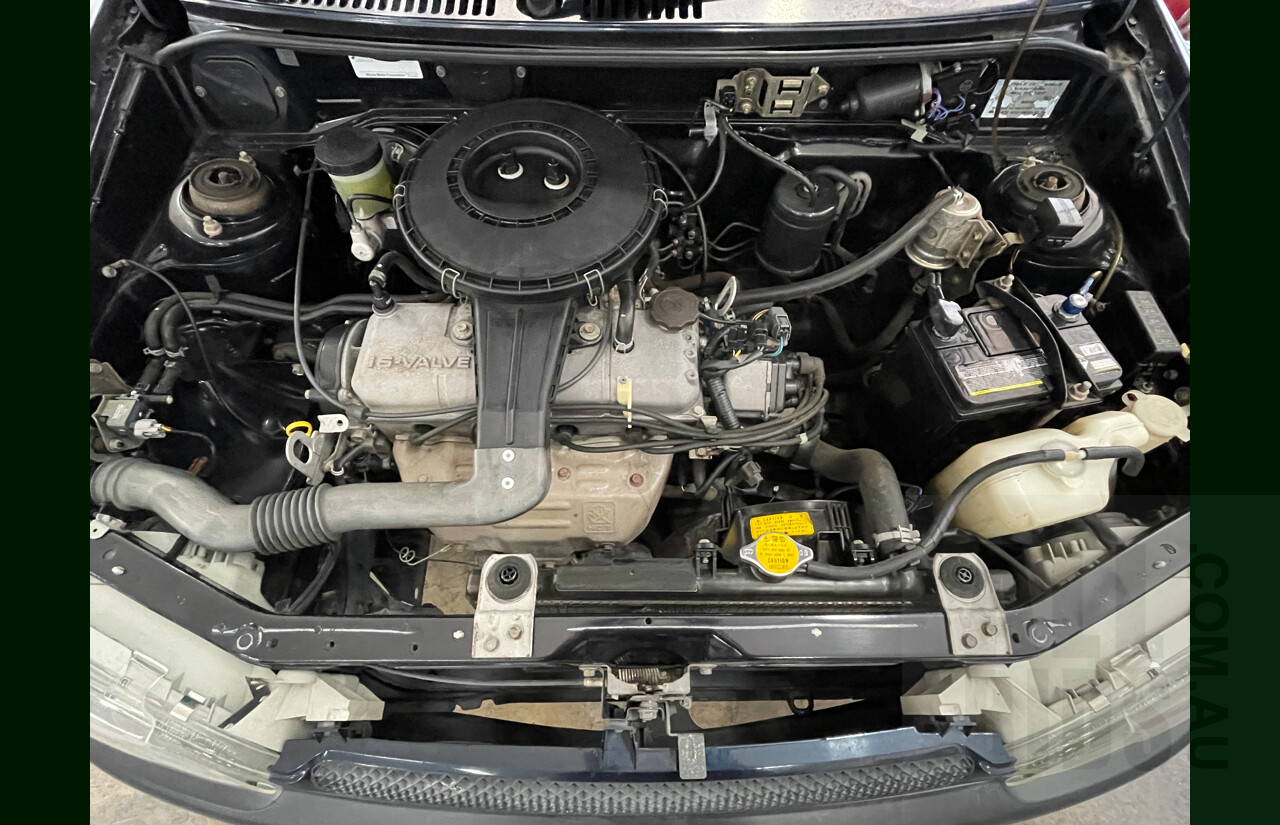 10/1996 Mazda 121 4d Sedan Blue 1.3L