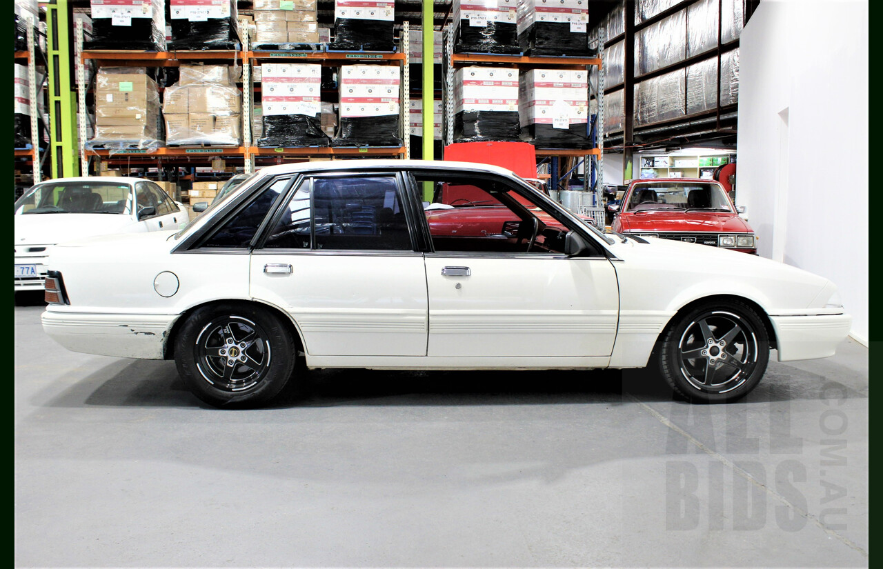 9/1986 Holden Berlina  VL 4d Sedan Alpine White 3.0L - 730hp Turbo