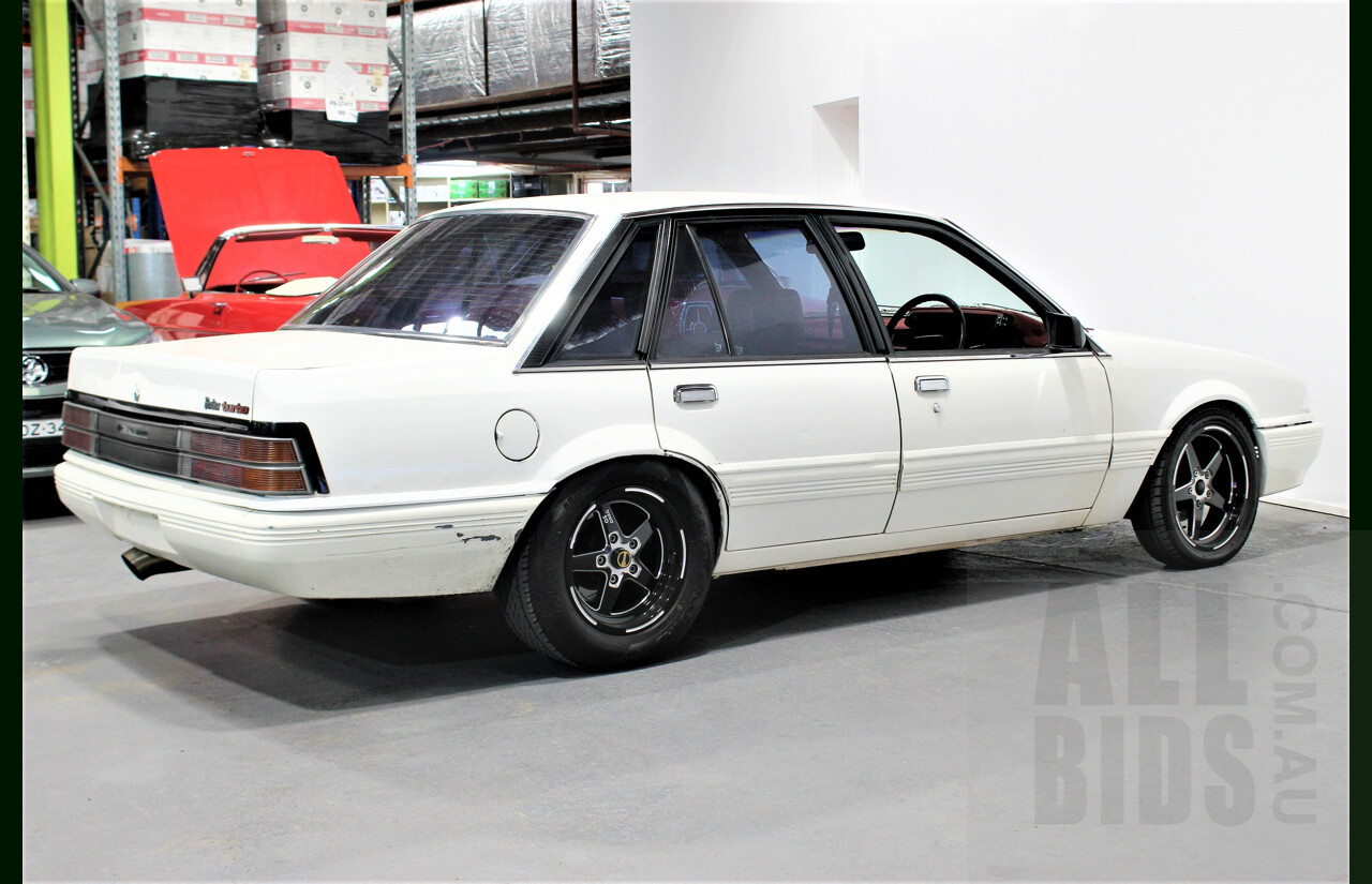 9/1986 Holden Berlina  VL 4d Sedan Alpine White 3.0L - 730hp Turbo