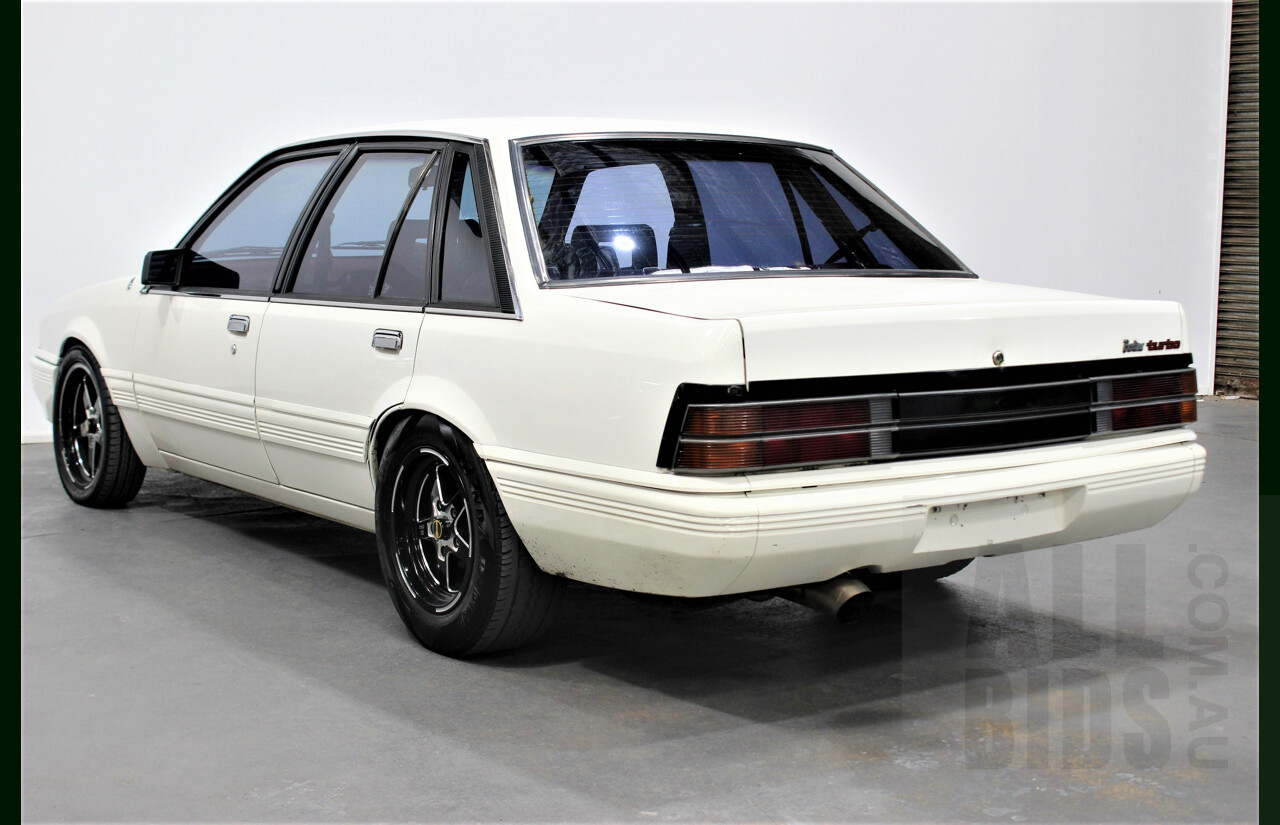 9/1986 Holden Berlina  VL 4d Sedan Alpine White 3.0L - 730hp Turbo
