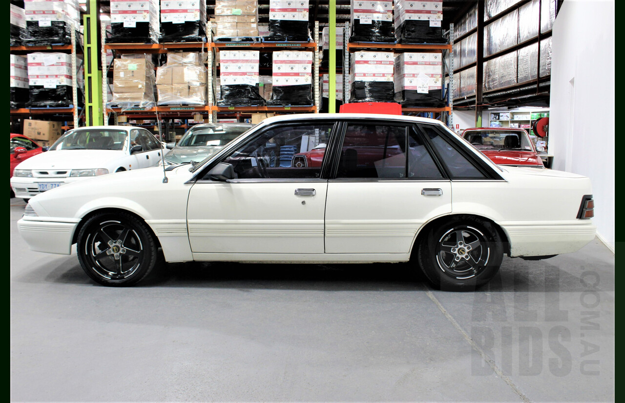 9/1986 Holden Berlina  VL 4d Sedan Alpine White 3.0L - 730hp Turbo