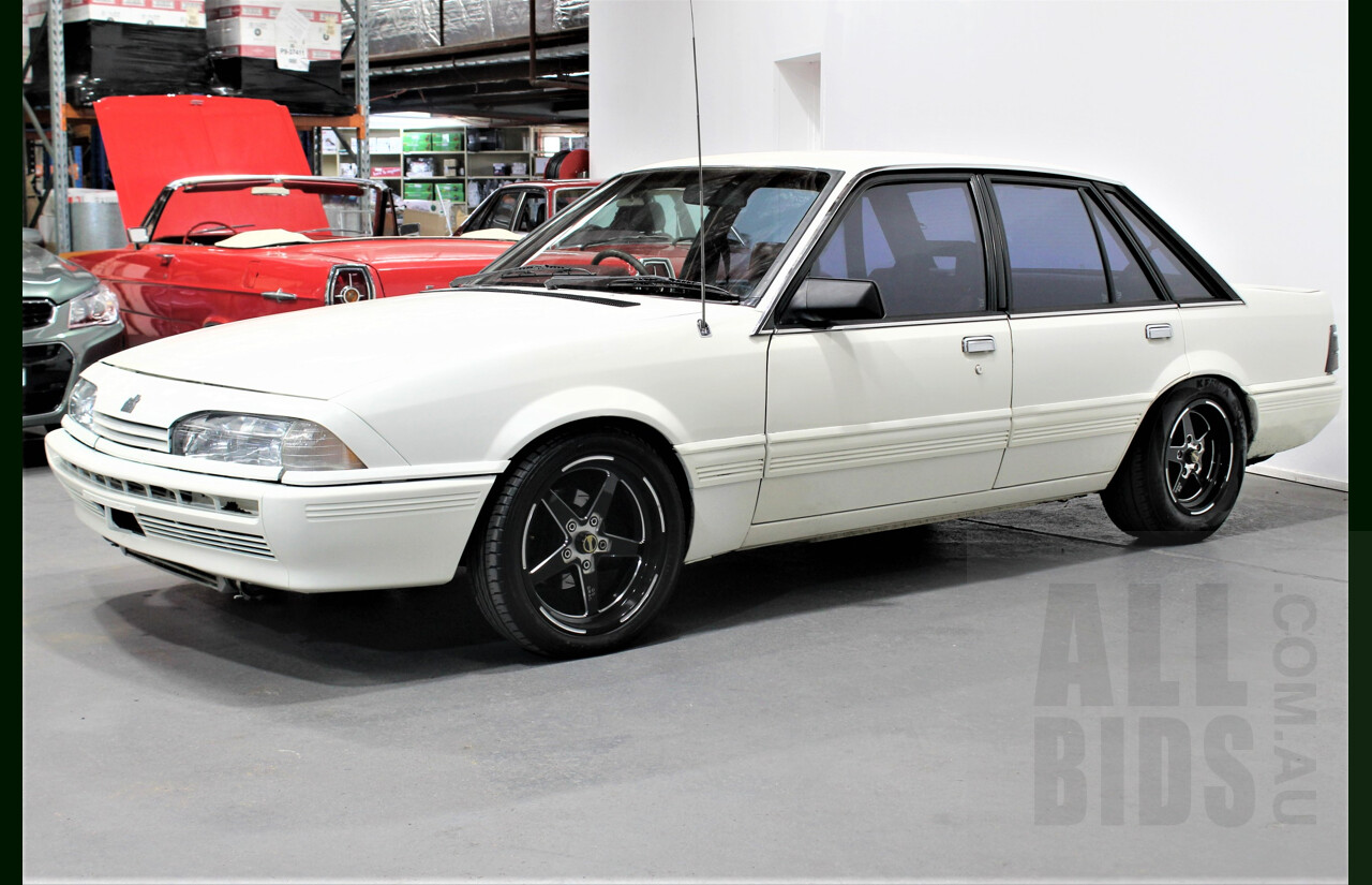 9/1986 Holden Berlina  VL 4d Sedan Alpine White 3.0L - 730hp Turbo