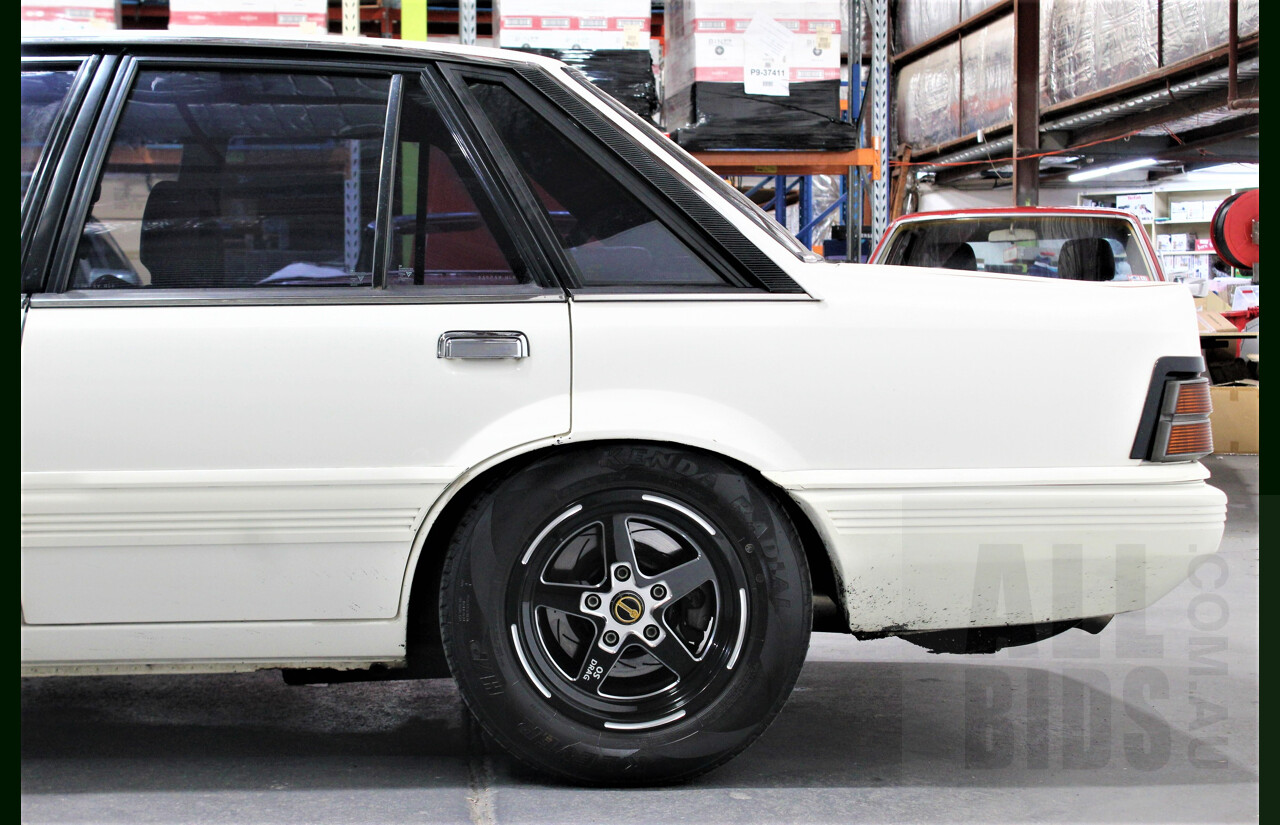 9/1986 Holden Berlina  VL 4d Sedan Alpine White 3.0L - 730hp Turbo