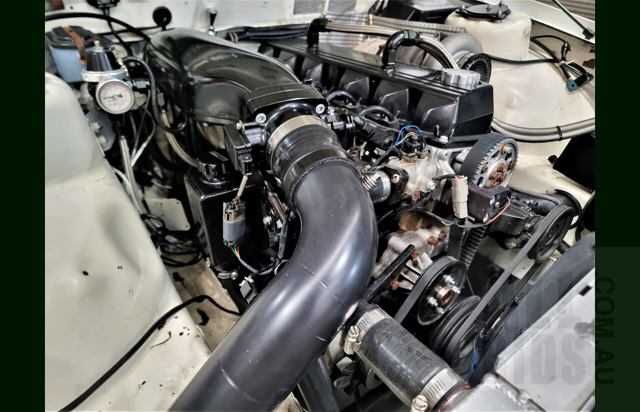 9/1986 Holden Berlina  VL 4d Sedan Alpine White 3.0L - 730hp Turbo