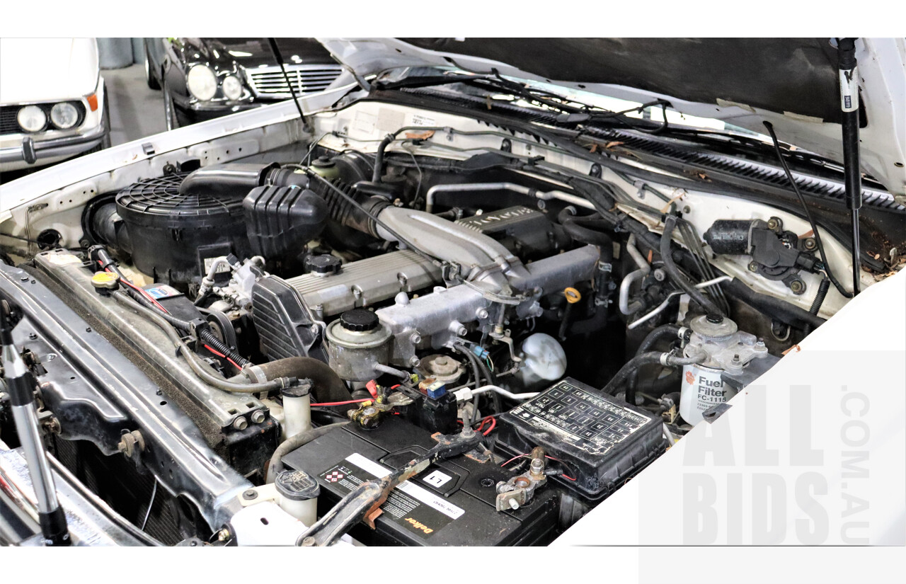 11/1999 Toyota Landcruiser (4x4) HZJ105R 4d Wagon White 4.2L Diesel