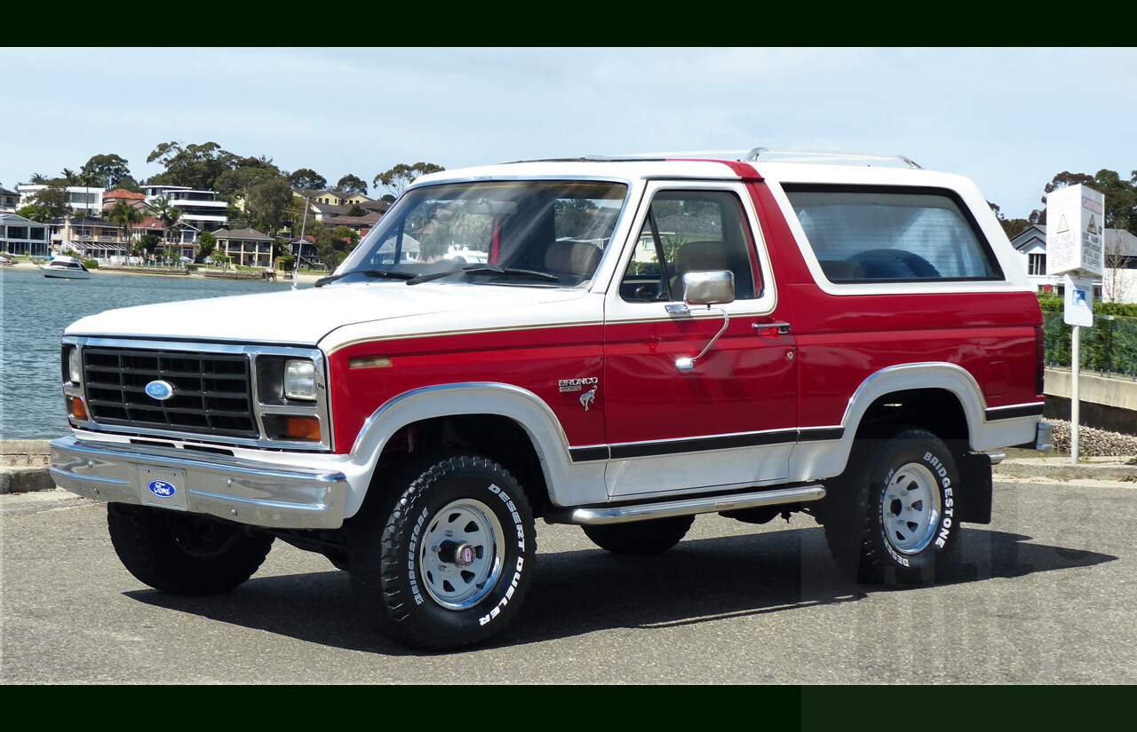 10/1984 Ford Bronco XLT (4x4) 2d Wagon Monza Red/White 351ci 5.8L V8